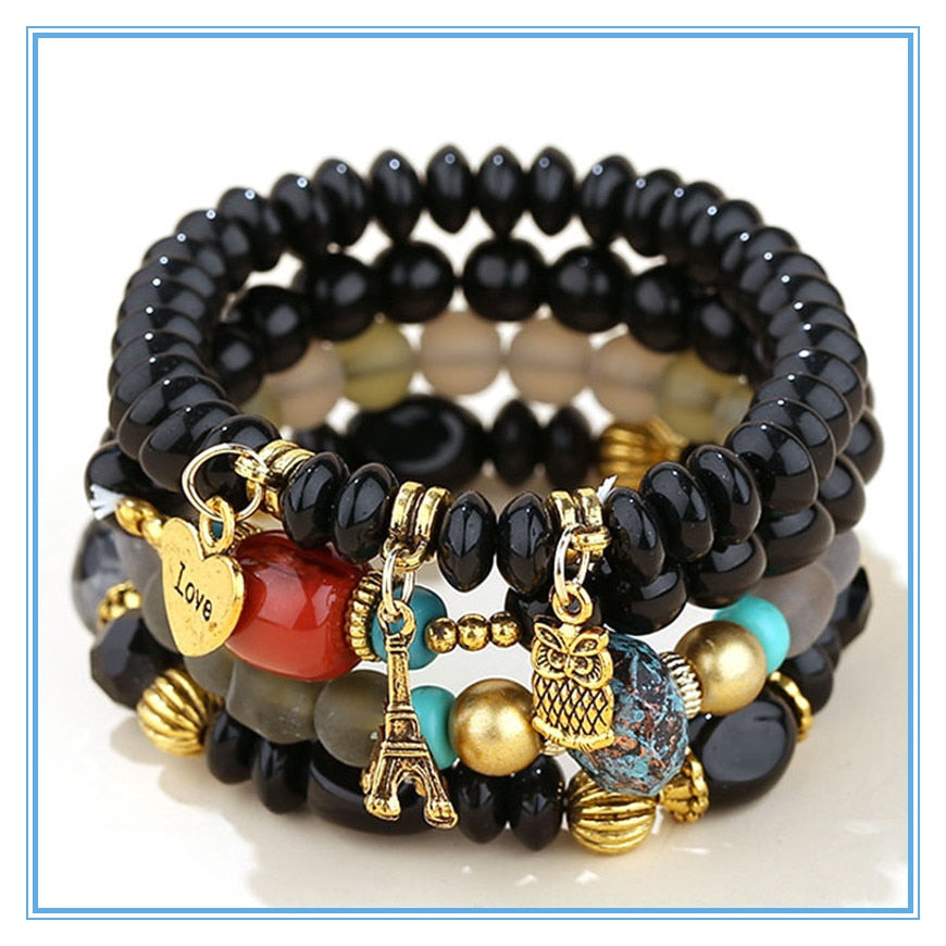 Zestaw bransoletek z koralikami i zawieszkami