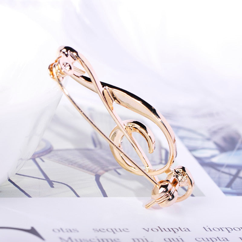 Broszka - klucz wiolinowy