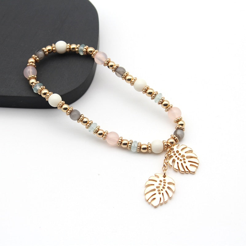 Bransoletka z koralików z zawieszką