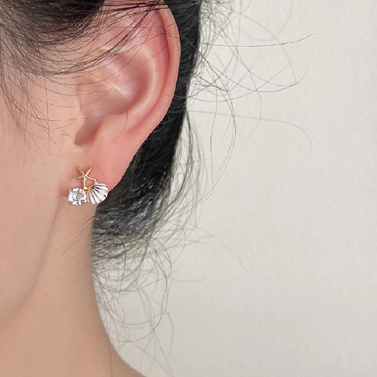 Kolczyki z motywem muszli